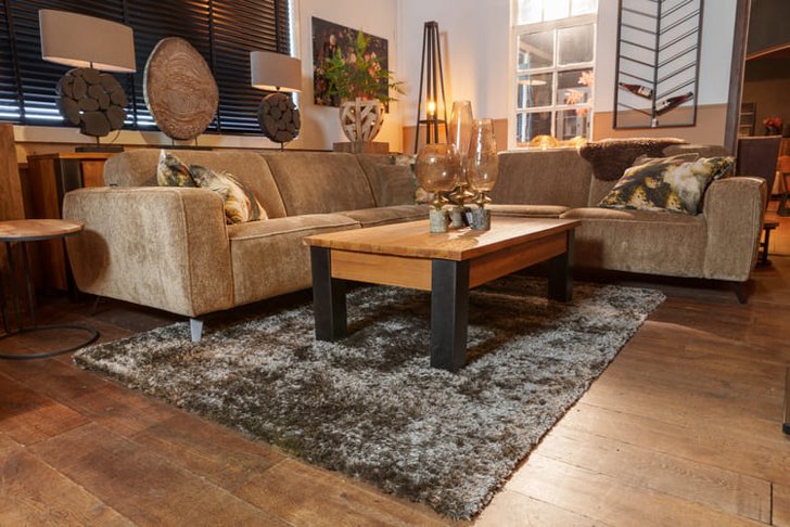 Ecksofa mit Tisch und Teppich - Schippers Lifestyle Enschede